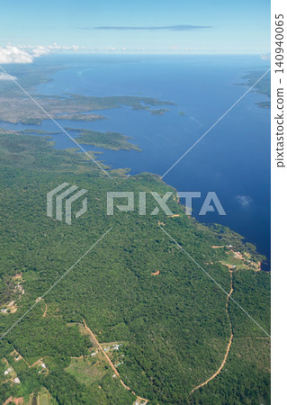 immensity of wide Negro river cutting through Amazon rainforest. Amazonas, Brazil immensity of wide Negro river cutting through Amazon rainforest. Amazonas, Brazil 140940065