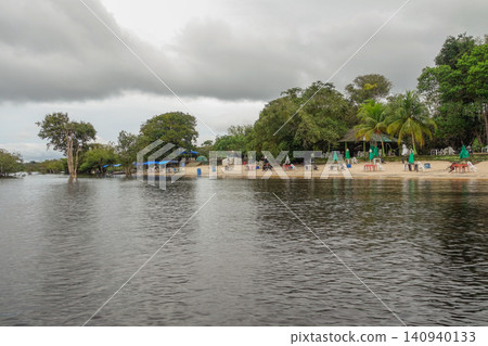 Lua Beach in Manaus, AM, Brazil. famous river beach on left bank of Negro river Lua Beach in Manaus, AM, Brazil. famous river beach on left bank of Negro river 140940133