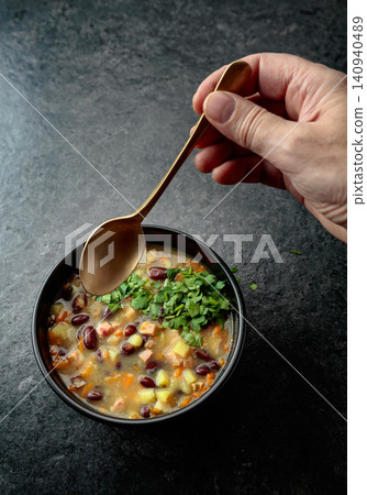 Red bean soup with potatoes, tomatoes, paprika, carrot, and bacon. Red bean soup with potatoes, tomatoes, paprika, carrot, and bacon. 140940489
