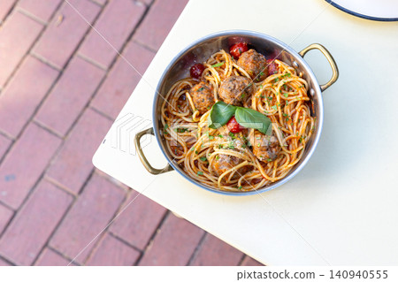 Close-up of classic Italian spaghetti and meatballs with rich tomato sauce Close-up of classic Italian spaghetti and meatballs with rich tomato sauce 140940555