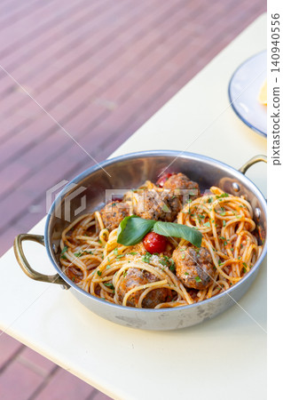Close-up of classic Italian spaghetti and meatballs with rich tomato sauce Close-up of classic Italian spaghetti and meatballs with rich tomato sauce 140940556