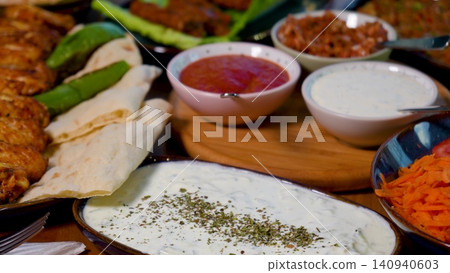 Video Luxury Lavish Turkish Dining Table Overflowing with Traditional Food, Meat Dishes, Fresh Bread and Meze Video Luxury Lavish Turkish Dining Table Overflowing with Traditional Food, Meat Dishes, Fresh Bread and Meze 140940603