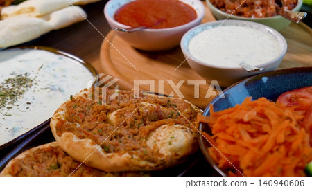 Video Luxury Lavish Turkish Dining Table Overflowing with Traditional Food, Meat Dishes, Fresh Bread and Meze Video Luxury Lavish Turkish Dining Table Overflowing with Traditional Food, Meat Dishes, Fresh Bread and Meze 140940606