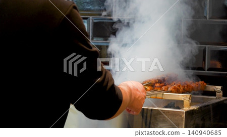 grilling traditional minced meat rolls on a smoky barbecue grill, preparing smoked meat, meat on the grill video grilling traditional minced meat rolls on a smoky barbecue grill, preparing smoked meat, meat on the grill video 140940685