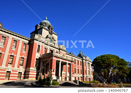 The Nagoya City Archives (formerly the Nagoya Court of Appeals) and the trees in its front garden on a clear day. The Nagoya City Archives (formerly the Nagoya Court of Appeals) and the trees in its front garden on a clear day. 140940767