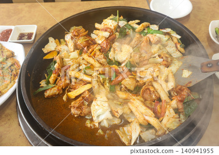 Raw Spicy Korean Chicken Stir Fry Dakgalbi with Vegetables 140941955