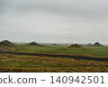 Volcanic craters of Alftaversgigar surrounded by green fields, South Iceland. 140942501