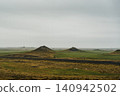 Volcanic craters of Alftaversgigar surrounded by green fields, South Iceland. 140942502