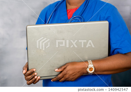 female doctor with laptop female doctor with laptop 140942547