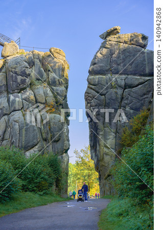 Stone massifs of the Teutoburg Forest, little people among the high cliffs. High quality photo 140942868