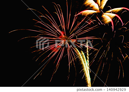 Fireworks lighting up the night sky. Pyrotechnics, abstract Fireworks lighting up the night sky. Pyrotechnics, abstract 140942929