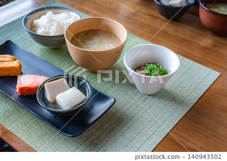 A Japanese-style breakfast set for two, served on the dining table. A Japanese-style breakfast set for two, served on the dining table. 140943502
