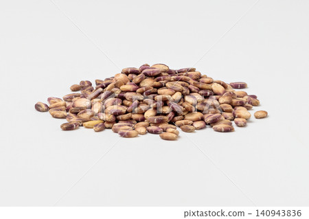 Purple glutinous barley arranged in a circle against a white background. Purple glutinous barley arranged in a circle against a white background. 140943836