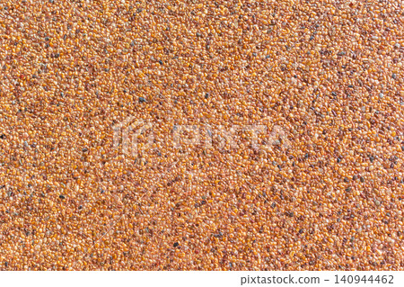 Exposed aggregate concrete surface small natural pebbles creating seamless rough texture ideal for architectural backgrounds flooring pavement construction design Exposed aggregate concrete surface small natural pebbles creating seamless rough texture ideal for architectural backgrounds flooring pavement construction design 140944462