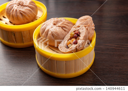 steamed Bun with Sweetened Multicolor Bean Filling, Traditional Chinese Baozi Dim Sum steamed Bun with Sweetened Multicolor Bean Filling, Traditional Chinese Baozi Dim Sum 140944611