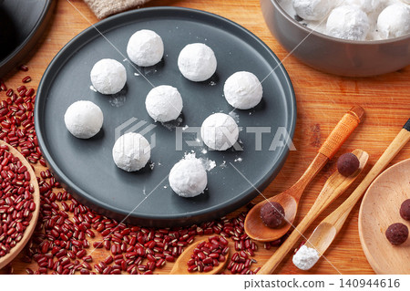 handmade raw sweet glutinous rice balls, freshly prepared Chinese Tangyuan mochi for festival handmade raw sweet glutinous rice balls, freshly prepared Chinese Tangyuan mochi for festival 140944616