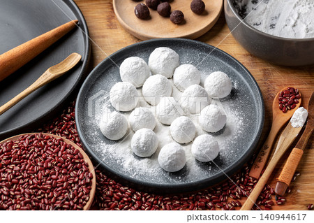 handmade raw sweet glutinous rice balls, freshly prepared Chinese Tangyuan mochi for festival handmade raw sweet glutinous rice balls, freshly prepared Chinese Tangyuan mochi for festival 140944617