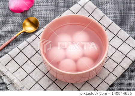 pink strawberry flavored sweet rice balls, cooked colorful Chinese Tangyuan mochi dessert pink strawberry flavored sweet rice balls, cooked colorful Chinese Tangyuan mochi dessert 140944636