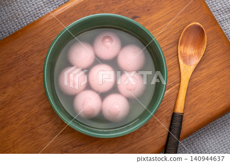 pink strawberry flavored sweet rice balls, cooked colorful Chinese Tangyuan mochi dessert pink strawberry flavored sweet rice balls, cooked colorful Chinese Tangyuan mochi dessert 140944637