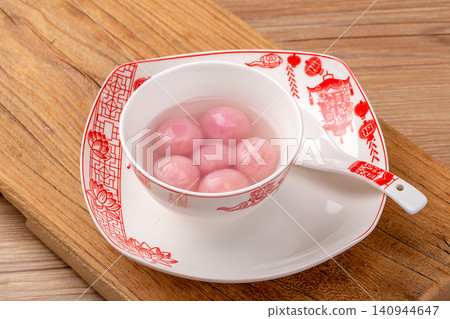 pink strawberry flavored sweet rice balls, cooked colorful Chinese Tangyuan mochi dessert pink strawberry flavored sweet rice balls, cooked colorful Chinese Tangyuan mochi dessert 140944647