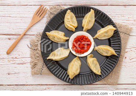 chinese traditional steamed dumplings, cooked Shaxian snacks Jiaozi with savory pork filling, authentic asian dim sum chinese traditional steamed dumplings, cooked Shaxian snacks Jiaozi with savory pork filling, authentic asian dim sum 140944913