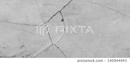 Abstract cracked concrete surface with a minimalist grunge texture. Abstract cracked concrete surface with a minimalist grunge texture. 140944943