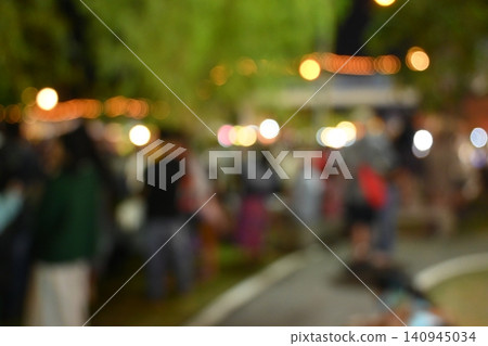 defocused light in the garden, celebration party event defocused light in the garden, celebration party event 140945034