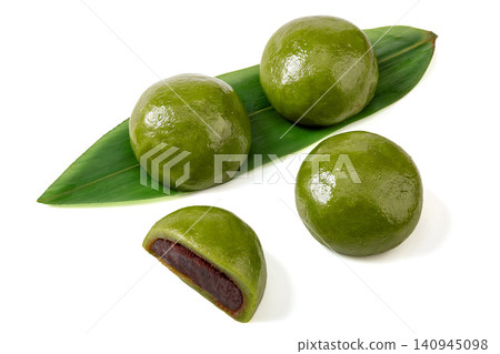 sweet green rice balls with red bean paste filling, classic Qingtuan mochi dessert for spring festival 140945098
