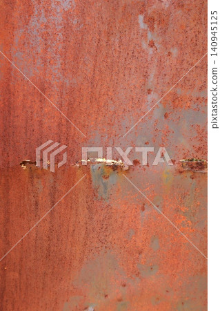 The rusty iron door at the back entrance of an old house The rusty iron door at the back entrance of an old house 140945125
