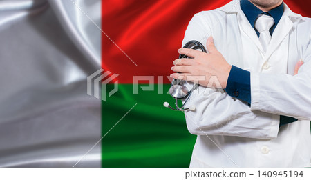 Malagasy national health system, Medical professional holding sthetoscope isolated Malagasy national health system, Medical professional holding sthetoscope isolated 140945194