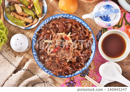 cantonese-styles stir-fried beef wideglass noodles cantonese-styles stir-fried beef wideglass noodles 140945247