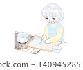 A senior woman cooking in the kitchen while looking at notes. 140945285