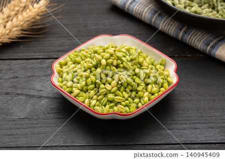 fresh green wheat kernels, raw organic whole grain berries, healthy plant-based superfood ingredient fresh green wheat kernels, raw organic whole grain berries, healthy plant-based superfood ingredient 140945409