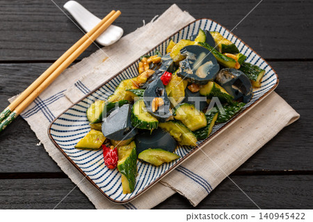 century Egg and Preserved Egg Sausage Smashed Cucumber Salad, Authentic Chinese Cold Appetizer with Garlic Sauce century Egg and Preserved Egg Sausage Smashed Cucumber Salad, Authentic Chinese Cold Appetizer with Garlic Sauce 140945422