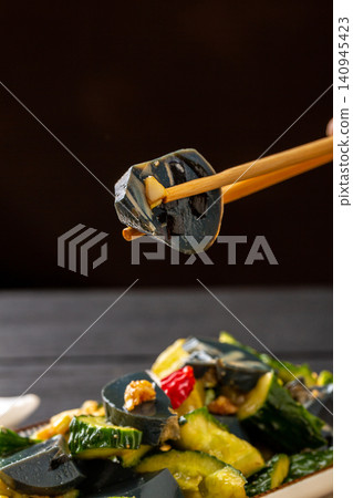 century Egg and Preserved Egg Sausage Smashed Cucumber Salad, Authentic Chinese Cold Appetizer with Garlic Sauce century Egg and Preserved Egg Sausage Smashed Cucumber Salad, Authentic Chinese Cold Appetizer with Garlic Sauce 140945423