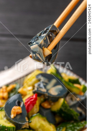 century Egg and Preserved Egg Sausage Smashed Cucumber Salad, Authentic Chinese Cold Appetizer with Garlic Sauce century Egg and Preserved Egg Sausage Smashed Cucumber Salad, Authentic Chinese Cold Appetizer with Garlic Sauce 140945424