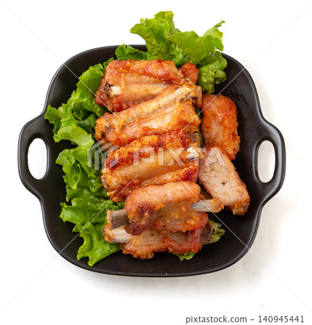 crispy Garlic Fried Pork Ribs, Traditional Chinese Style Deep Fried Pork Spare Ribs crispy Garlic Fried Pork Ribs, Traditional Chinese Style Deep Fried Pork Spare Ribs 140945441