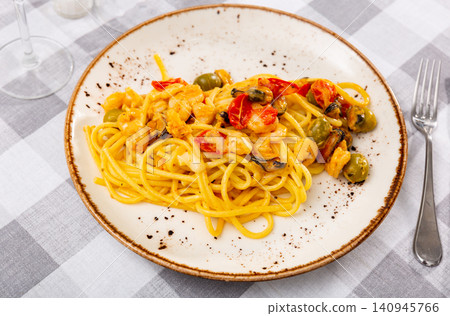 Pasta macaroni with seafood contains tiger prawns, shell mussels, spices and white sauce Pasta macaroni with seafood contains tiger prawns, shell mussels, spices and white sauce 140945766