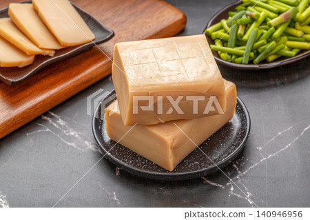 traditional Chinese Rice Tofu Blocks Rice Jelly Cake with Garlic Scapes traditional Chinese Rice Tofu Blocks Rice Jelly Cake with Garlic Scapes 140946956