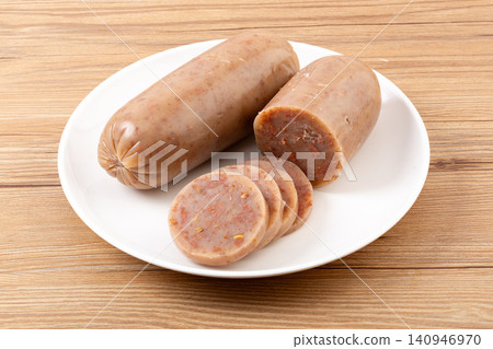 chinese Donkey Meat Starch Menzi Sausage on Plate Black Background 140946970