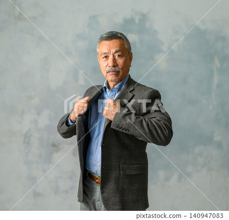 A man grabbing his jacket A man grabbing his jacket 140947083