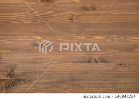 Warm wooden surface features subtle grains and knots. Natural materials concept Warm wooden surface features subtle grains and knots. Natural materials concept 140947284