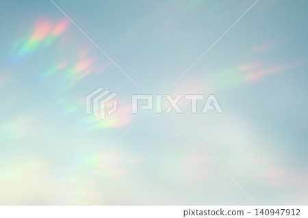 A shimmering background with scattered rainbow-colored light. A shimmering background with scattered rainbow-colored light. 140947912