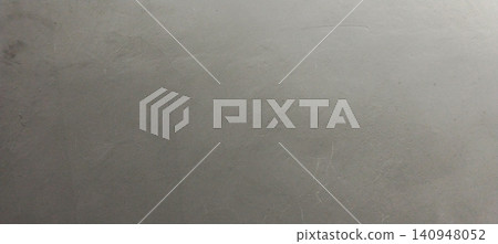 Gray concrete wall texture with fine scratches and a grunge-style surface. Gray concrete wall texture with fine scratches and a grunge-style surface. 140948052