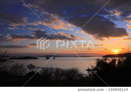 View of Kuroshima Venus Road, the islands of the Seto Inland Sea, and the sunset from Ushimado Tenjin Shrine View of Kuroshima Venus Road, the islands of the Seto Inland Sea, and the sunset from Ushimado Tenjin Shrine 140948124