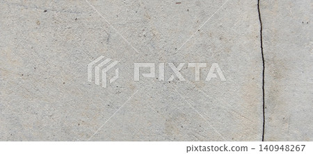 Light gray concrete surface texture with vertical cracks. Light gray concrete surface texture with vertical cracks. 140948267