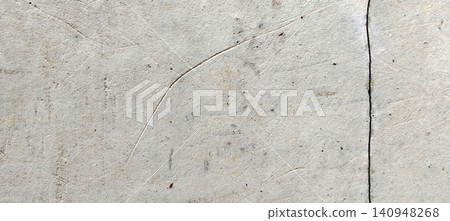 Light gray concrete surface texture with vertical cracks. Light gray concrete surface texture with vertical cracks. 140948268