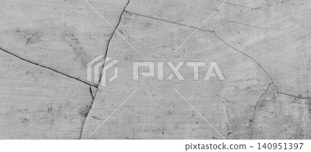 Cracked gray concrete wall texture, with natural cracks and weathered surface. Cracked gray concrete wall texture, with natural cracks and weathered surface. 140951397