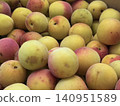 A scene of early summer with rows of sweetly fragrant, perfectly ripe plums in season. 140951589