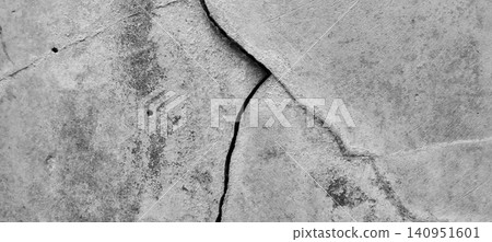 The texture of the concrete wall was cracked and weathered. The texture of the concrete wall was cracked and weathered. 140951601